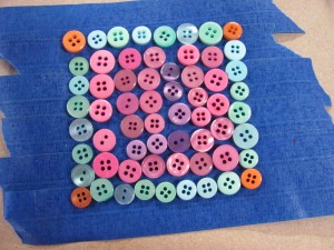 make a button design with tape