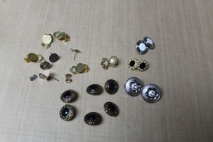 Match up buttons into earring pairs.