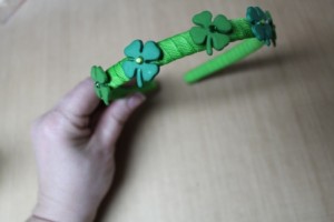 Glue and space clovers evenly onto headband as shown.