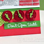 Twine-tied buttons on holiday card