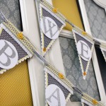 handmade yellow and grey baby shower decor