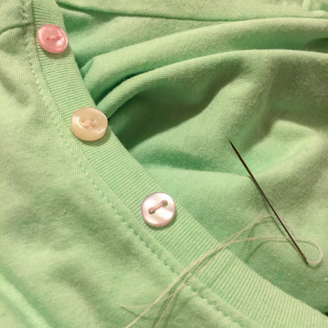 Sewing buttons on neckline