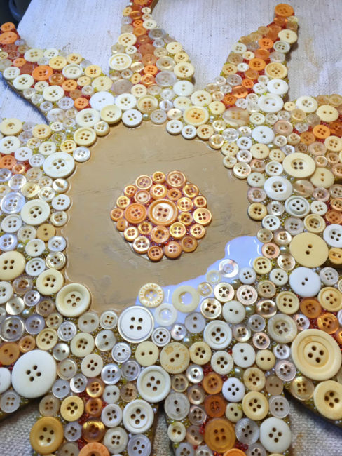 Button Sun Mosaic Construction