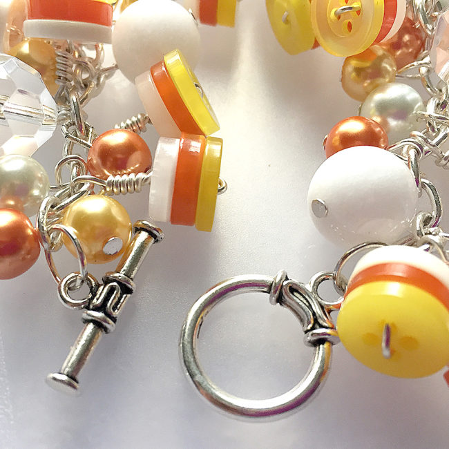 how to make a candy corn bracelet using 28 Lilac Lane buttons! 