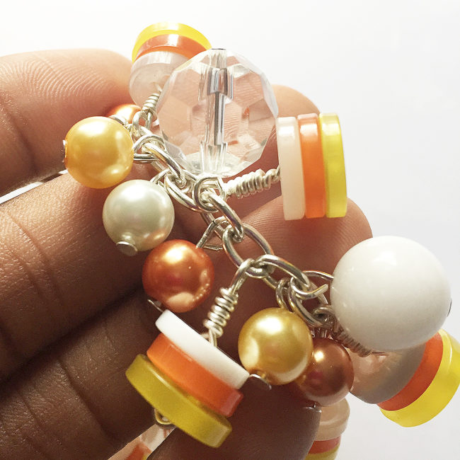 how to make a candy corn bracelet using 28 Lilac Lane buttons! 