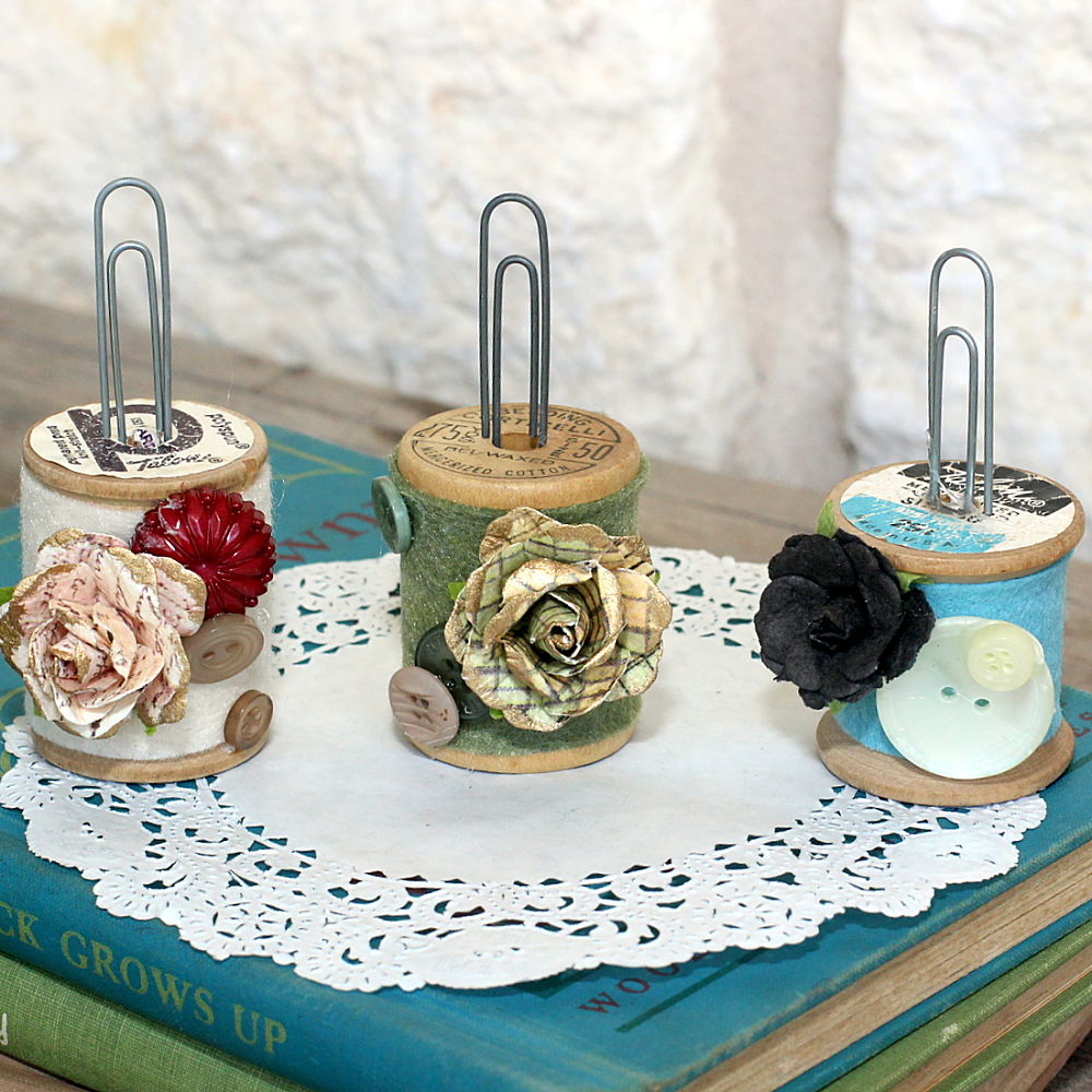 Cute card holders made from empty embellished spools.